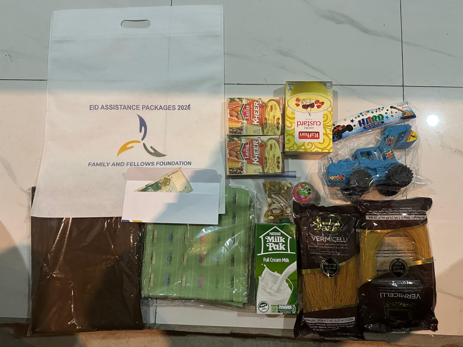 Eid assistance package with food, clothing, toys, and cash support