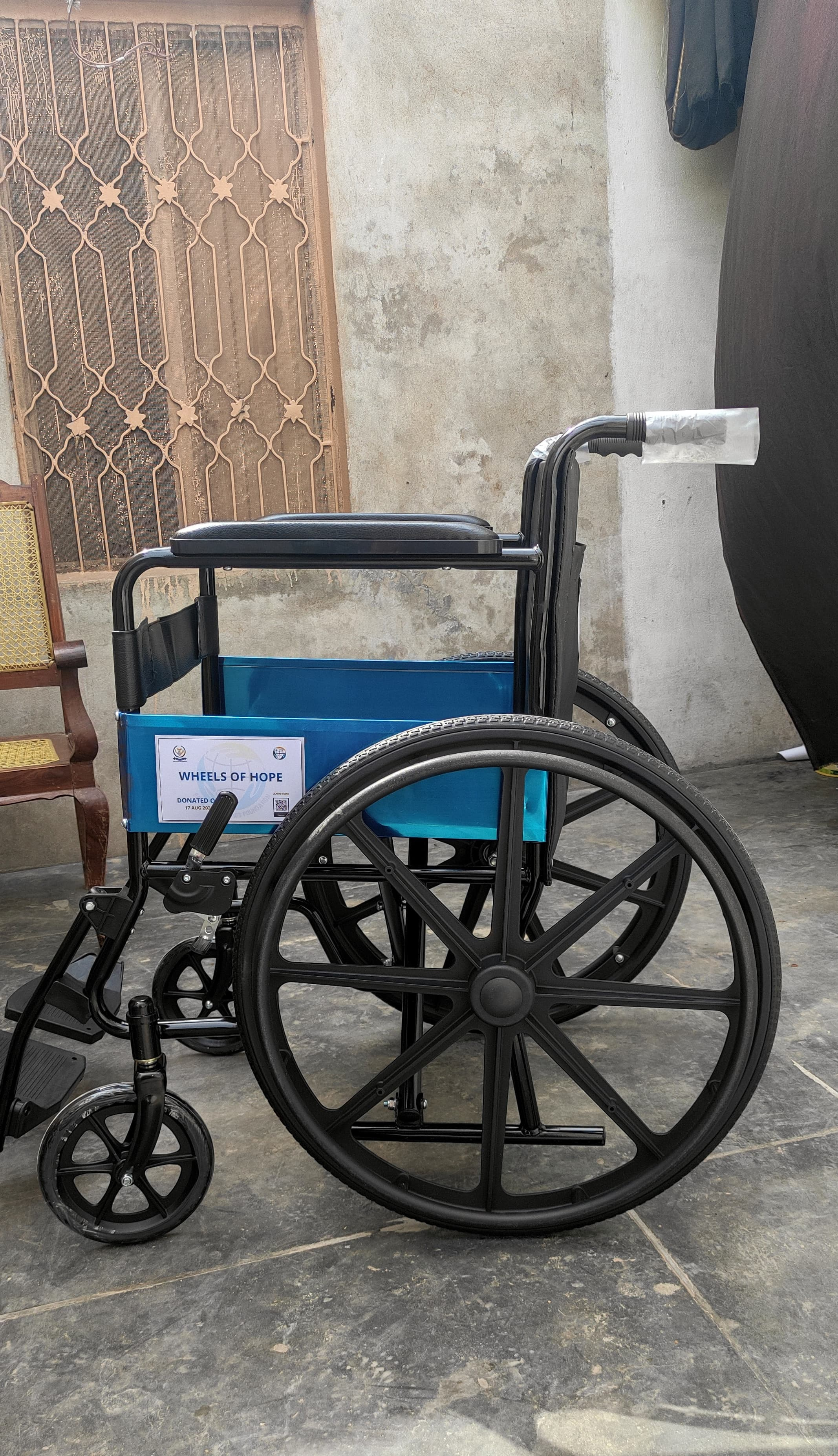 Wheels Of Hope branded wheelchair